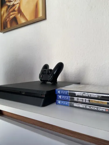 PS4 slim 1 TB + jogos + controle