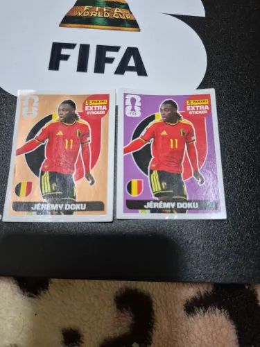 FIGURINHAS LEGEND JEREMY DOKU OURO E LILAS - COPA DO MUNDO 2026