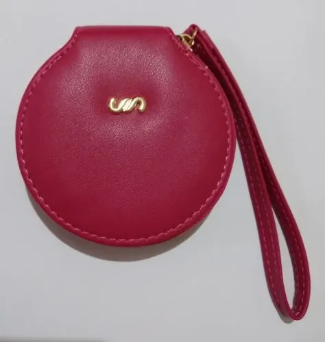Bolsinha mão feminina pink