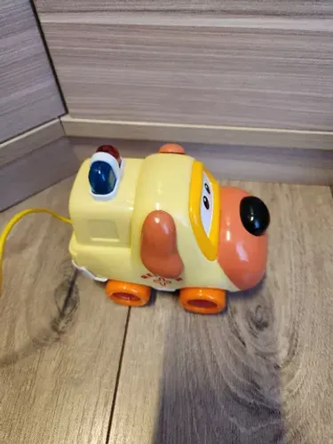 Ambulância de cachorrinho com controle remoto fisher price