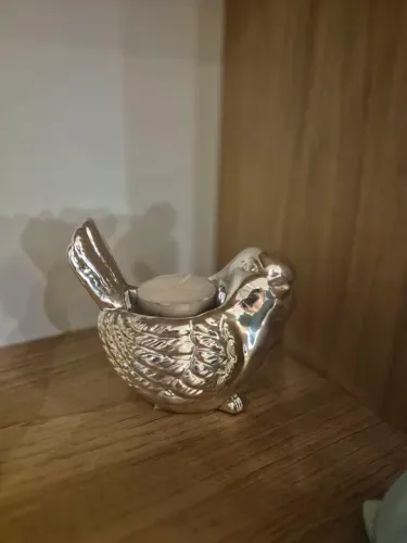 Pássaro porta-vela decorativo em prata
