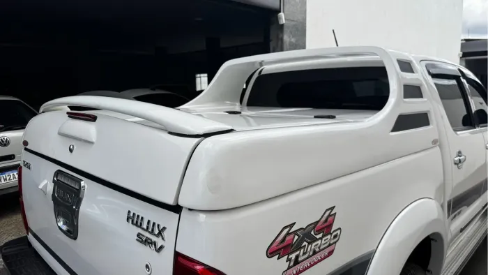 Tampão capota marítima Hilux 2006 até 2015