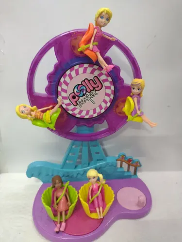 Roda gigante da Polly com 5 bonequinhas...com mecanismo que gira todas as cadeirinhas..