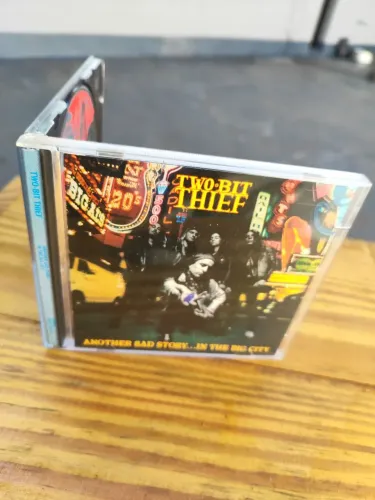 CD Two-Bit Thief - Another Sad Story... In The Big City