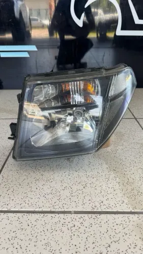 FAROL NISSAN FRONTIER 2007/ ESQUERDO 