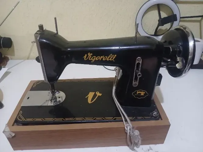excelente máquina de costura