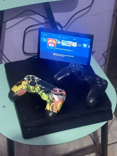 Ps4 Slim + 6 jogos RED DEAD FIFA26/ GTA