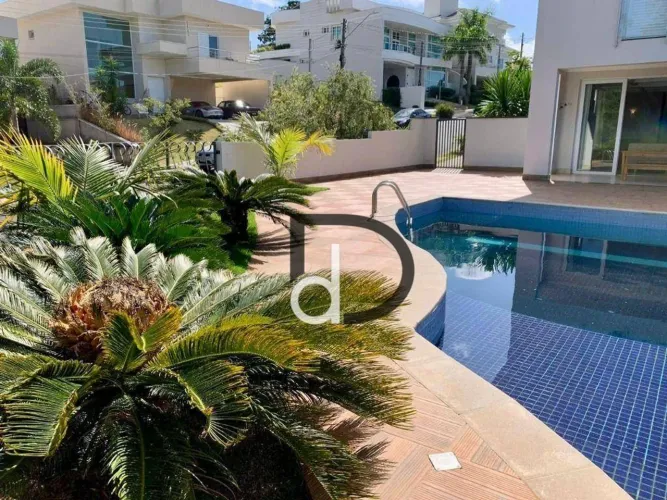 Casa com 4 quartos para alugar, 565 m² por R$ 30.000/mês - Condomínio Porto Seguro Village