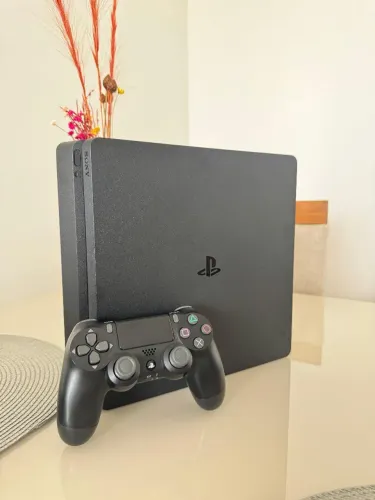 PS4 slim 1 TB + filtro de linha aparelho impecável
