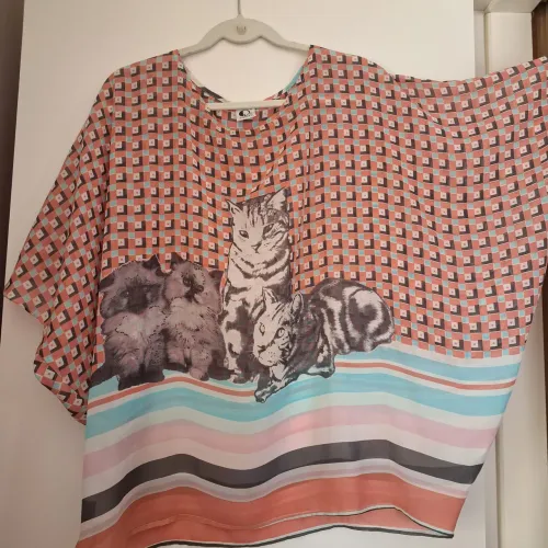 1 Blusa , tipo seda