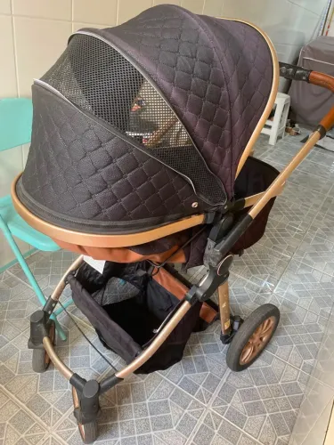 Carrinho de bebê semi novo marca Passear