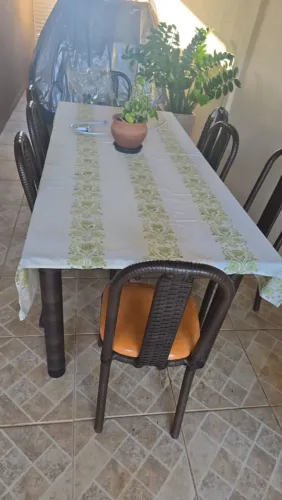 Mesa de vidro 2 metros com 8 cadeiras almofadas 