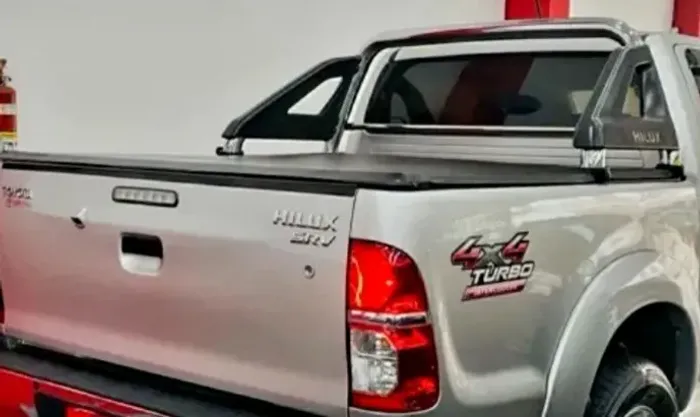 Capota maritima hilux com santo Antônio
