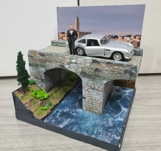 Diorama filme 007 James Bond com carro Austin Martin DB5