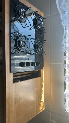 Vendo fogão cooktop acompanhando um armário 