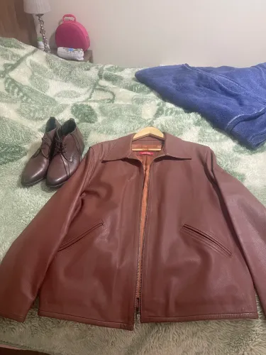 Jaqueta de couro e bota Ferracini