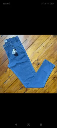 Vendesse essa calça jeans tamanho 38 nao usei pq não deu certo em mim 