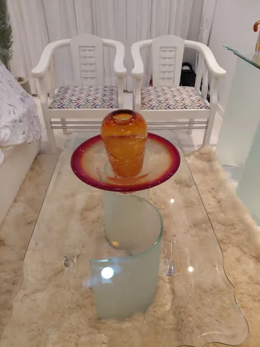 Tapete em pelo de carneiro.