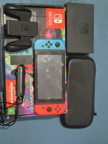Nintendo Switch + 4 jogos pokemono