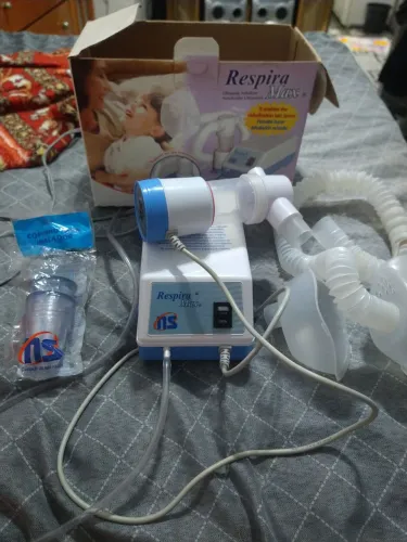 Inalador Respira Max. ESTA COM DEFEITO. PARA CONSERTO OU RETIRADA DE PEÇA. VALOR 50 REAIS