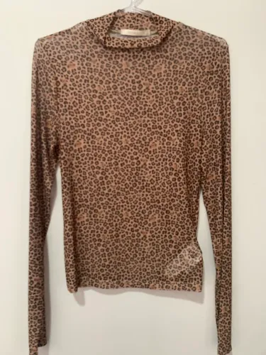Blusa de tule de oncinha