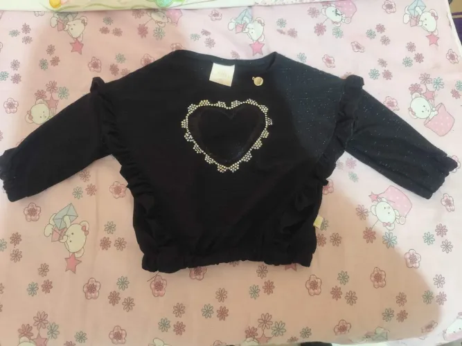 Blusa nova Kiki xodó com coração em glitter