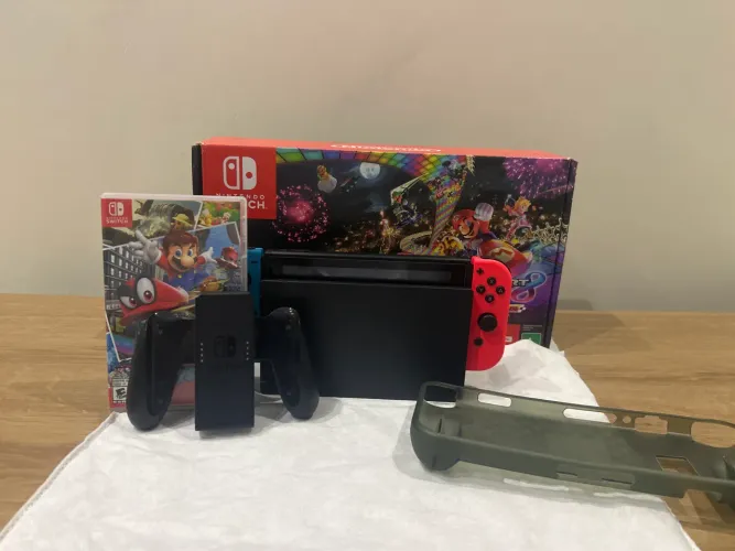 Nintendo Swift acompanhado com um jogo Mario,controle,película e capinha