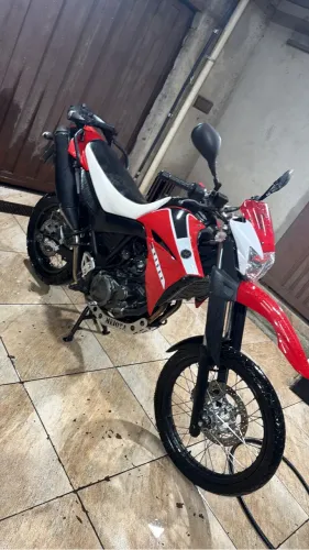Troco em carro , XT 660 super conservada 