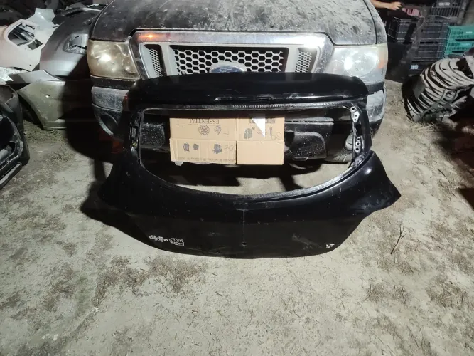 Tampa traseira porta-malas Onix Joy LT LTZ 2013 2014 2015 2016 2017 2018 2019 original GM