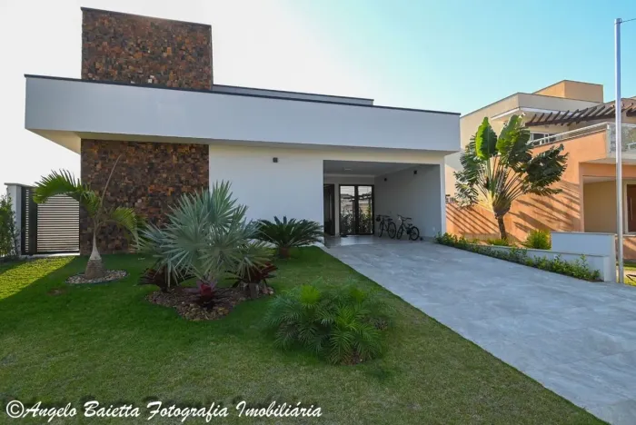Casa em condomínio com 3 dormitórios à venda, 161 m² por R$ 1.200.000