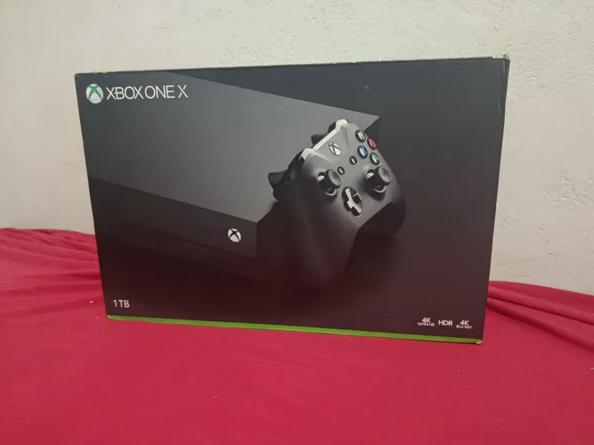 Xbox One X recondicionado (ótimo) com 4 jogos físicos à venda