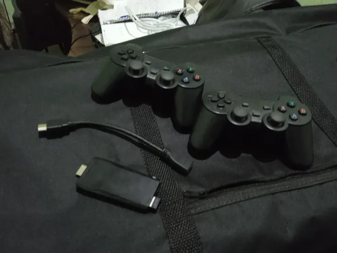 Vendemos ps2 com 2 controles com bateria e o jogo tem 4200 jogos 