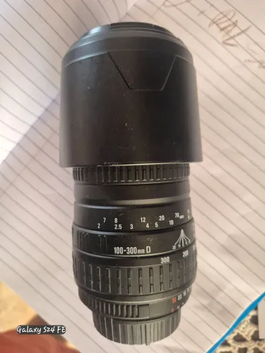 Lente sigma 100 x 300