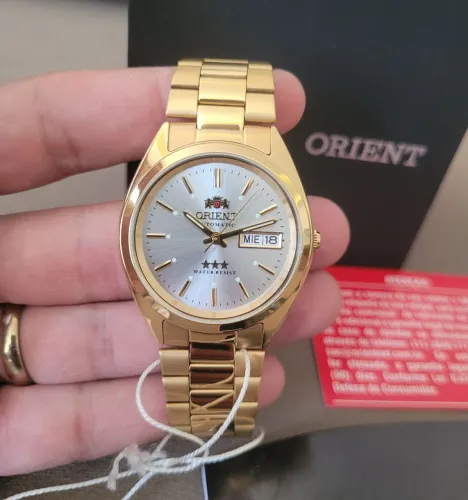 Orient 3 estrelas dourado
