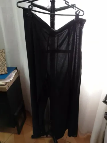 Calça Preta Transparente, muceline de seda e novinha