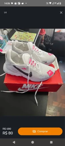 Tênis Nike branco com detalhes em rosa