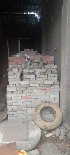 Máquinas e   tijolos 