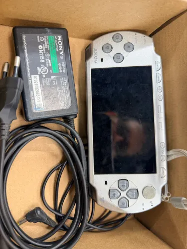 silver Sony PSP-1000 console - Final Fantasy