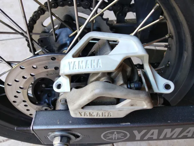 Protetor pinça freio Yamaha Lander 