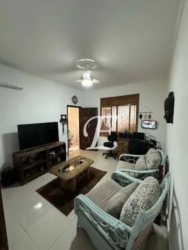 Casa com 3 dormitórios à venda, 110 m² por R$ 650.000,00 - Vila Guilhermina - Praia Grande