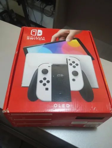 NINTENDO switch oled com caixa e película 
