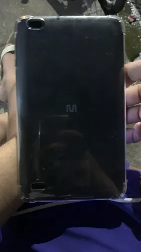Tablet Multilaser na caixa todo completo