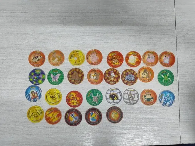 Tazos pokémon redondo Elma chips (10 a 30 reais)
