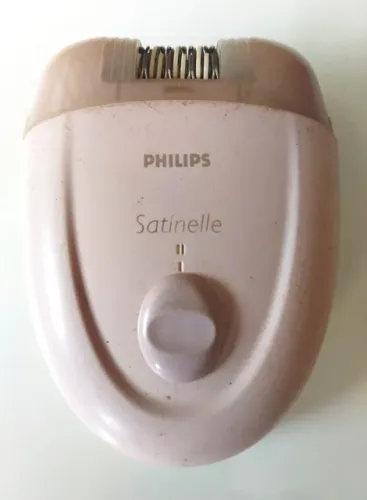 Depilador elétrico Philips modelo Satinelle. Bivolt. Cor de rosa. Compacto e leve. Usado