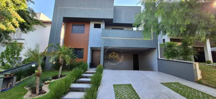 Casa contemporânea à venda no Condomínio Vivenda das Quaresmas, em Valinhos/SP.