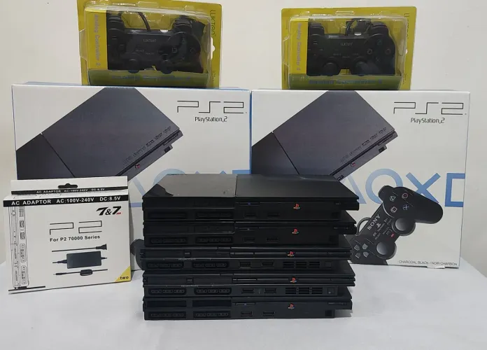 Playstation 2 slim + jogos + controles 