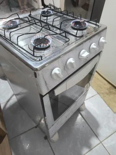 Fogão Atlas 4 bocas automático funcionando perfeitamente. Fogão usado não aceito oferta