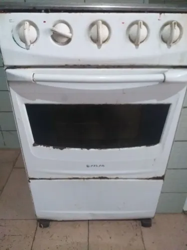 Fogão 4 bocas funcionando normalmente em perfeito estado ligar para *
