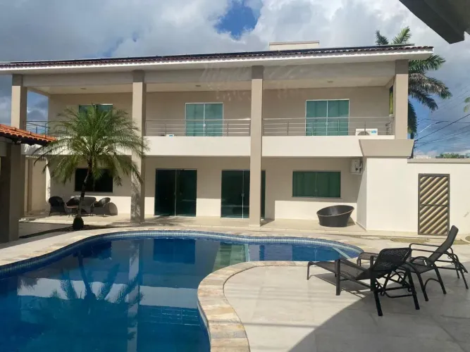 Casa duplex no Encontro das Águas. 550m2, 4 suites. Piscina. Energia Solar. Completa