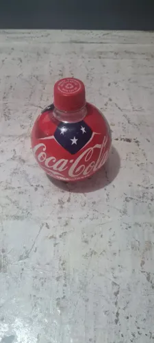 Garrafa da Coca Cola em formato de bola